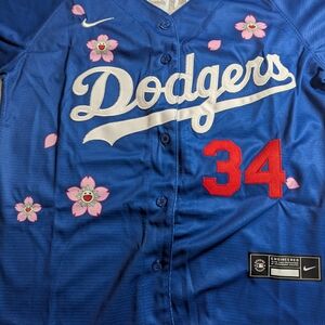 Nike Blue Jersey with Red Number and White Script